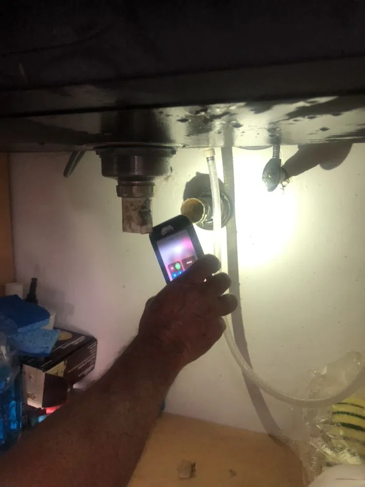 Slide of Omega Drain Services