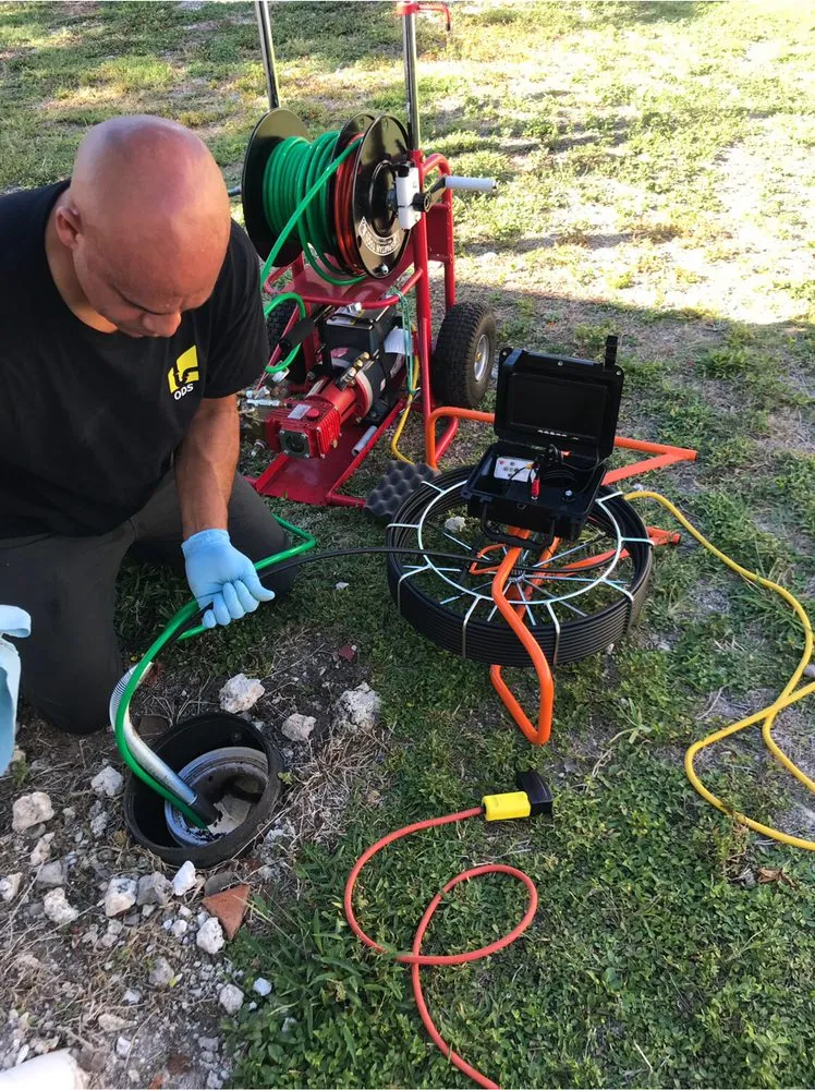 Slide of Omega Drain Services