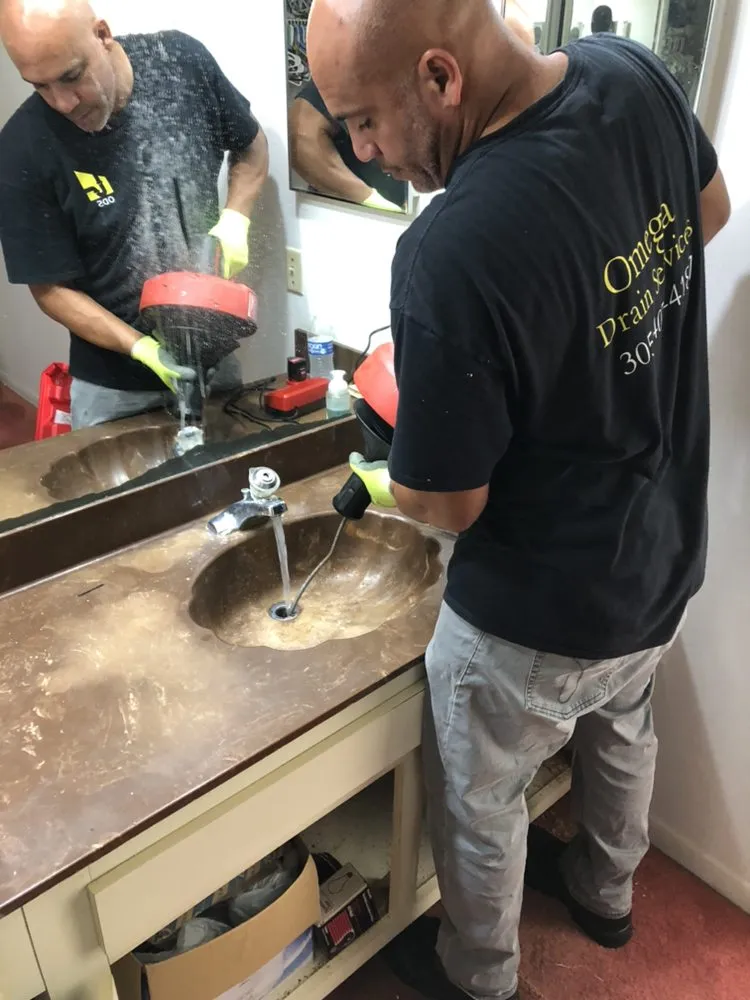 Slide of Omega Drain Services