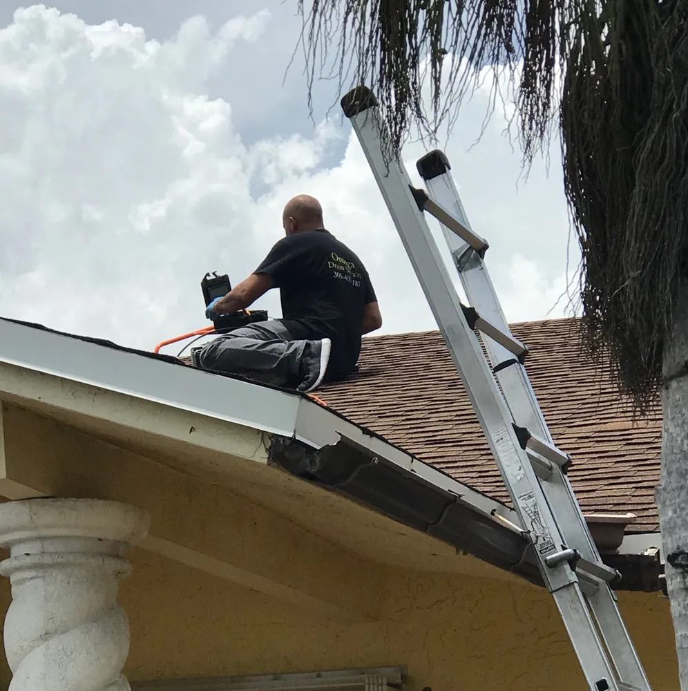 Slide of Omega Drain Services