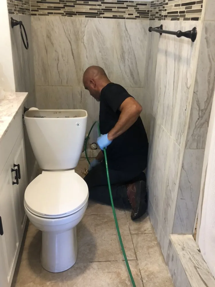 Slide of Omega Drain Services