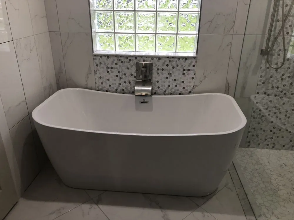 Slide of Oscars and Paul Plumbing & Mechanical