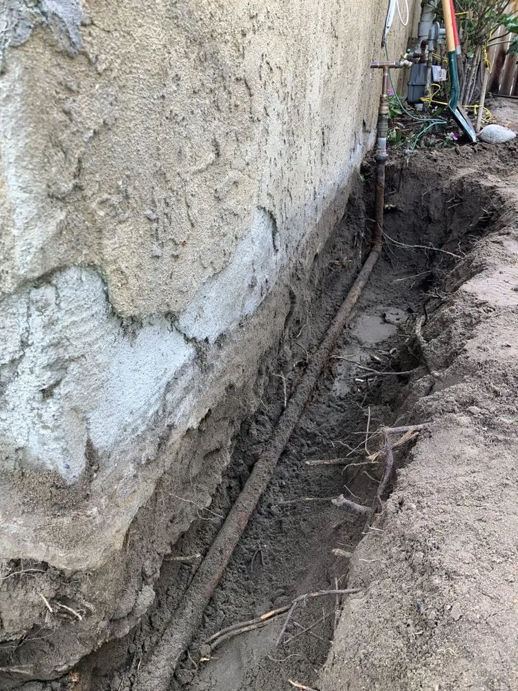 Slide of OT Plumbing Services