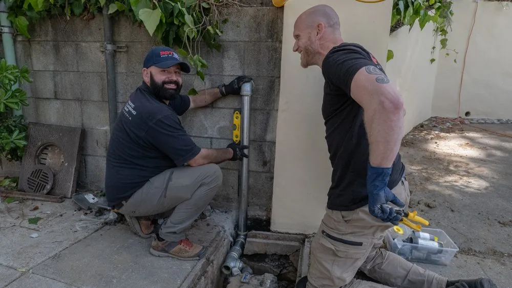 Slide of Pacific Plumbing Team