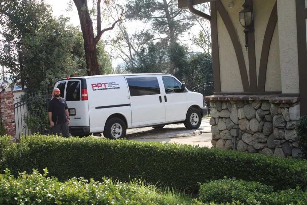 Slide of Pacific Plumbing Team