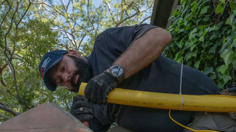 Slide of Pacific Plumbing Team