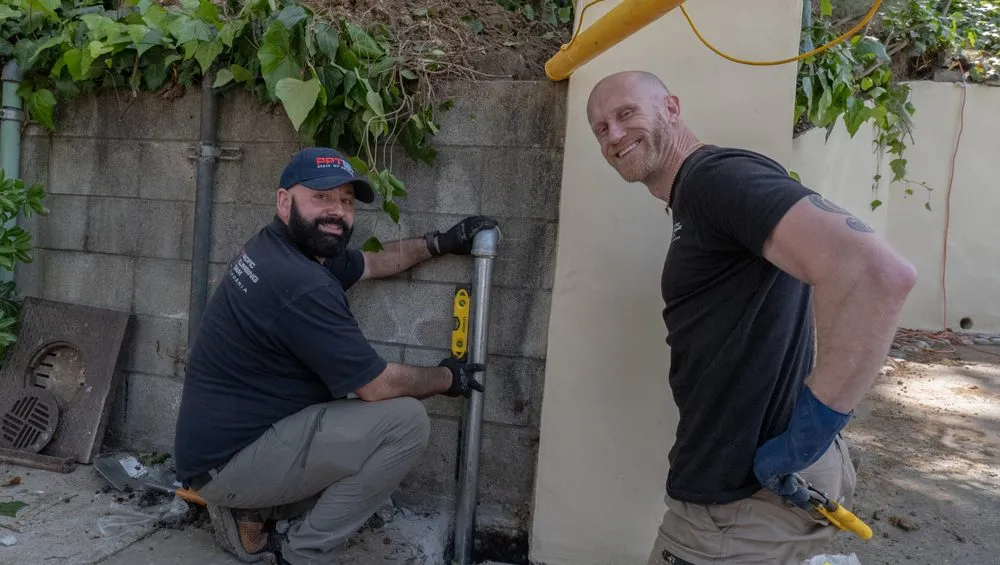 Slide of Pacific Plumbing Team