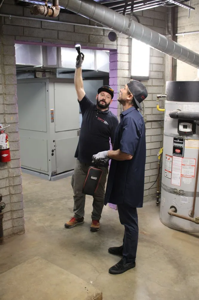 Slide of Pacific Plumbing Team