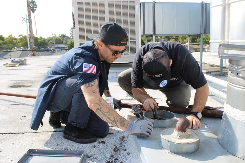 Slide of Pacific Plumbing Team