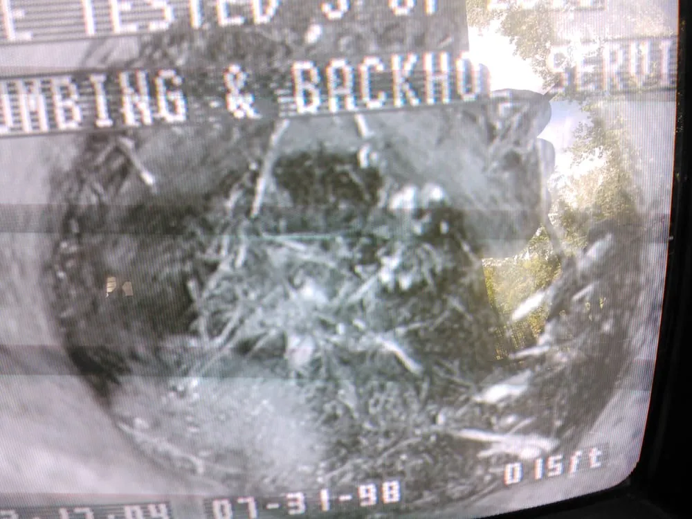 Slide of PG Plumbing & Backhoe Service