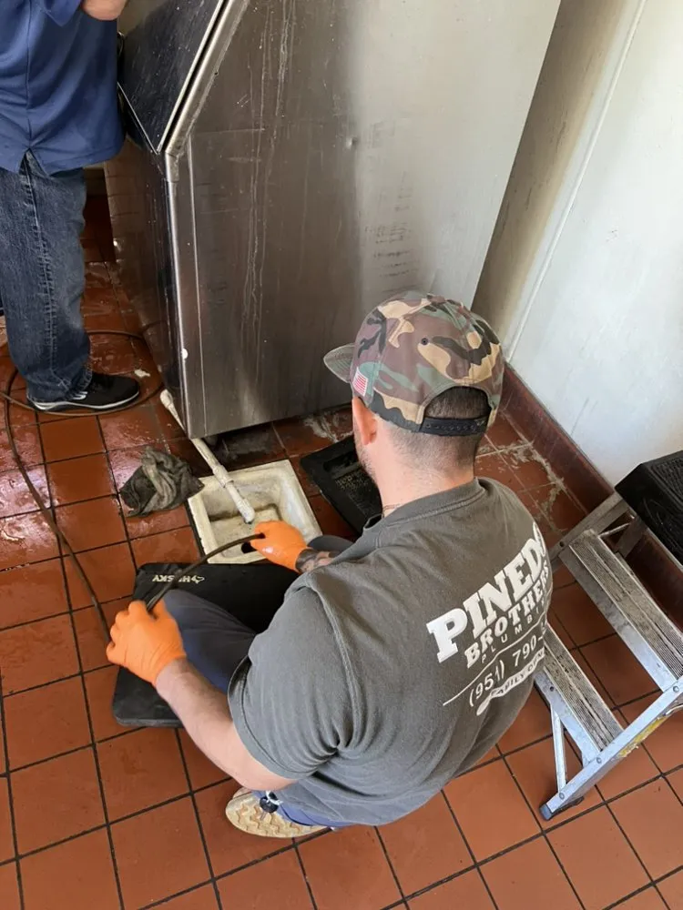 Slide of Pinedo Bro Plumbing Rooter