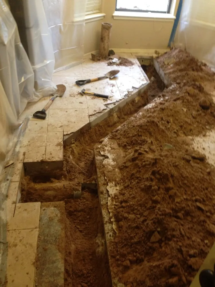 Slide of Pipe Down Slab Leak Repair