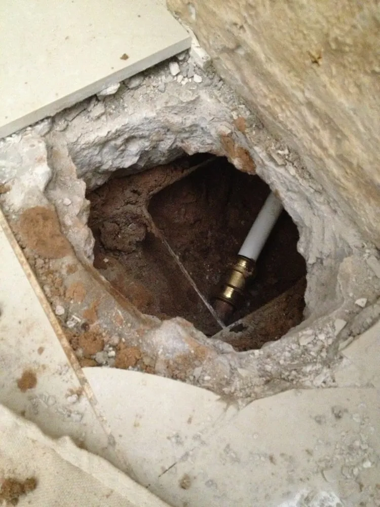 Slide of Pipe Down Slab Leak Repair