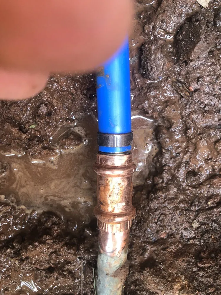 Slide of Pipe Down Slab Leak Repair