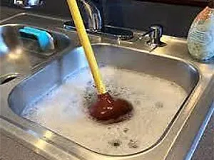 Slide of Plumber In DC