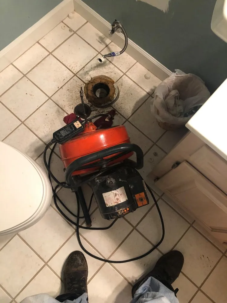 Slide of Plumber On Call