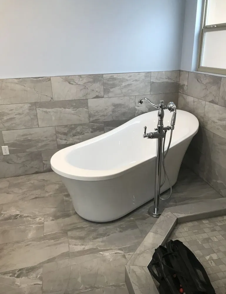 Slide of Plumbing & Company