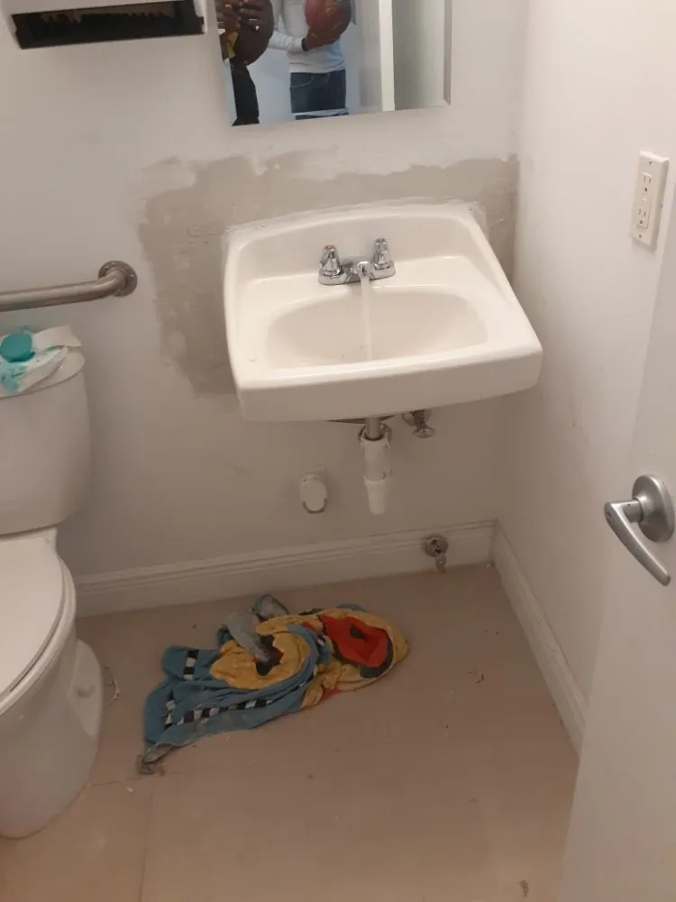 Slide of Plumbing By LAW