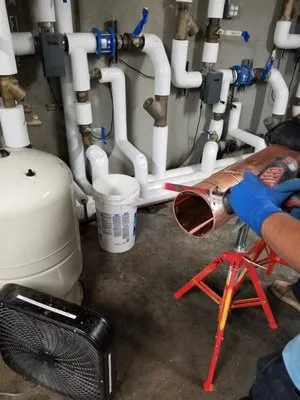 PMC Plumbing Inc Logo