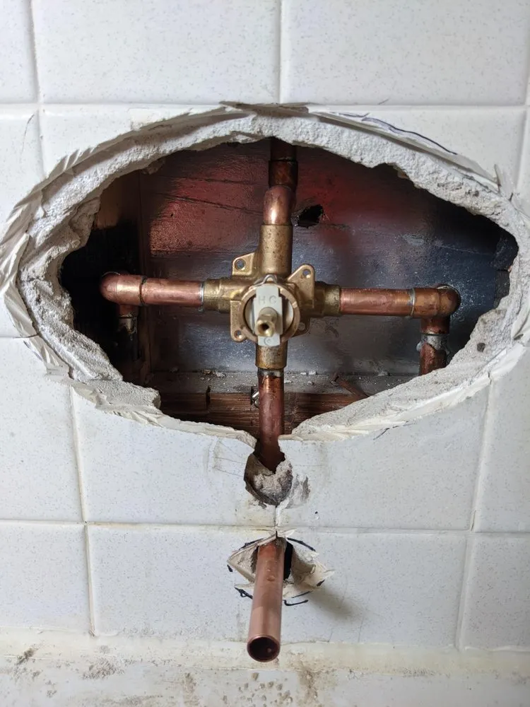 Slide of Poonan's Plumbing