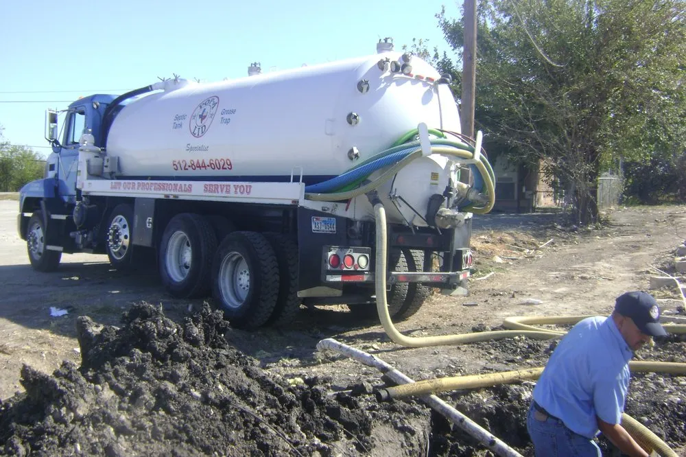 Slide of Pop-A-Lid Septic & Grease Trap Services