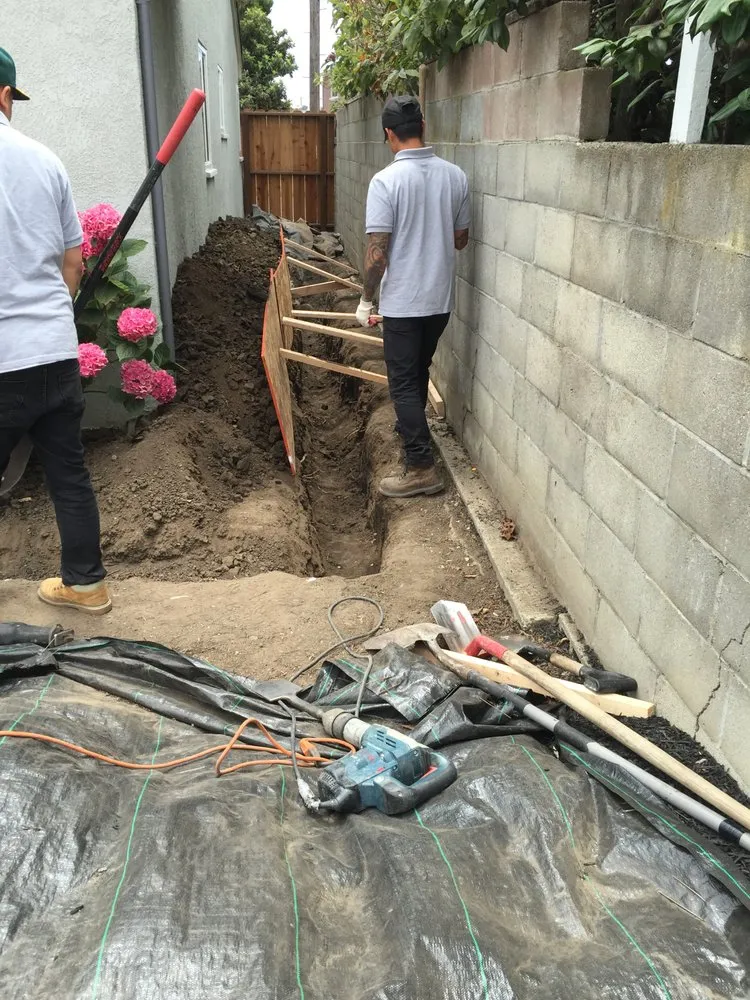 Slide of Pop-N-Go Plumbing and Drains