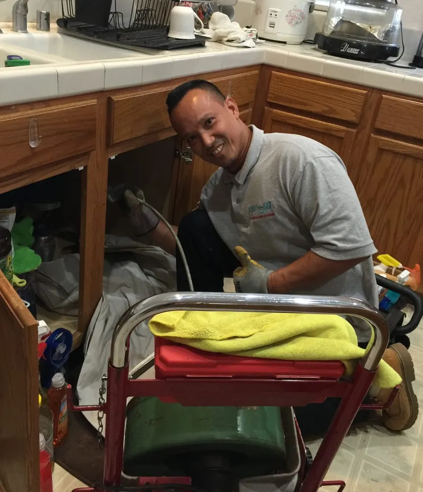 Slide of Pop N Go Plumbing and Drains