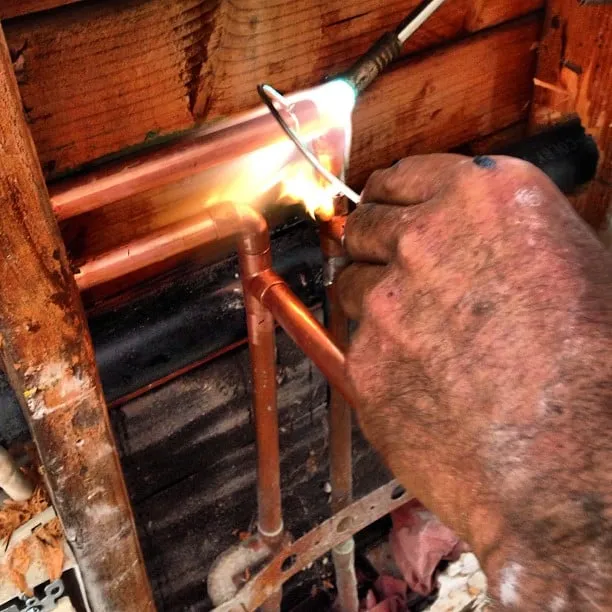 Slide of Poseidon Plumbing