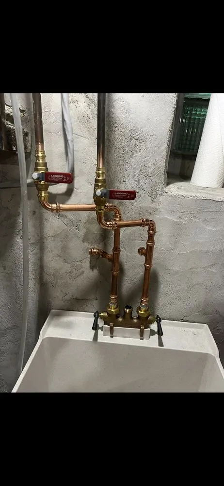 Slide of Pouring Rain Plumbing