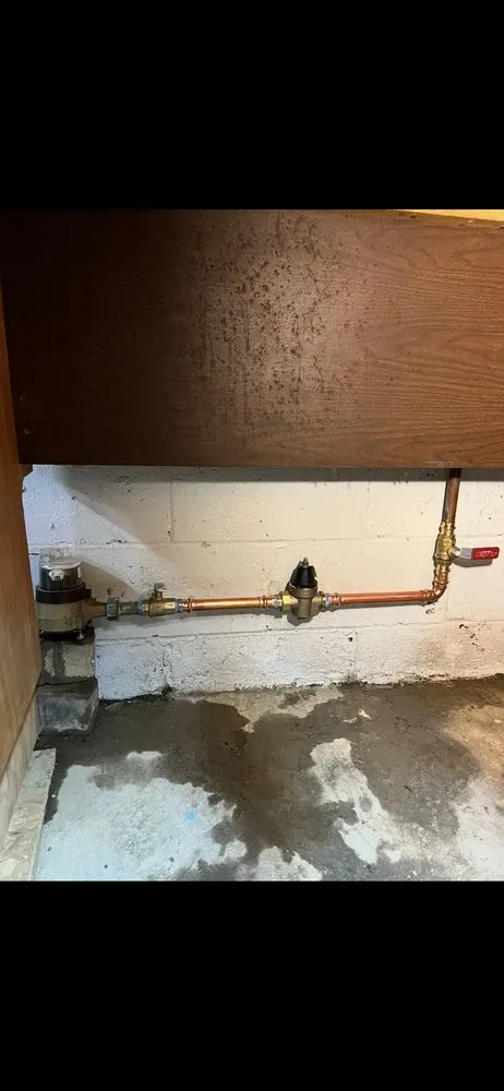 Slide of Pouring Rain Plumbing