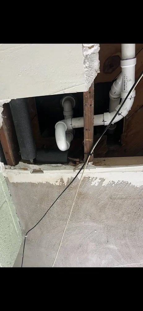 Slide of Pouring Rain Plumbing