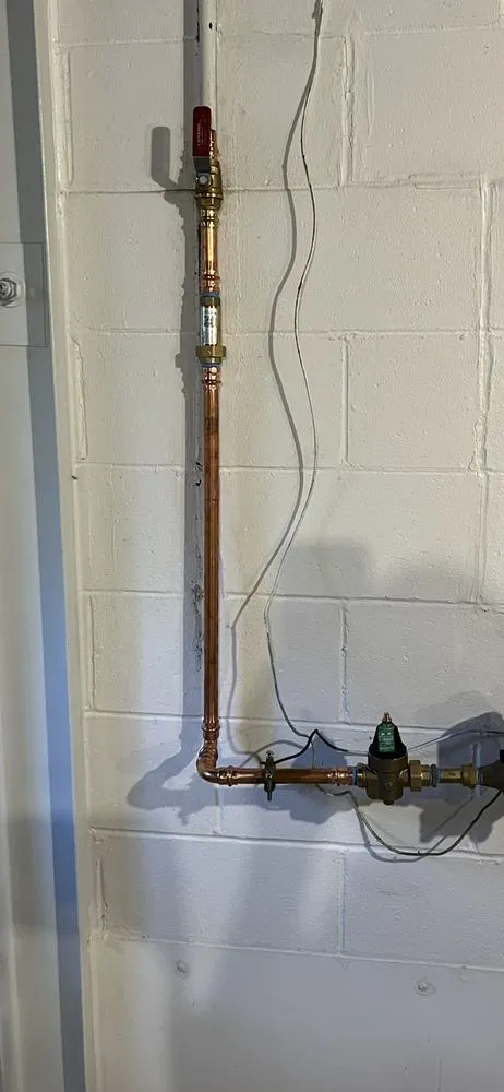 Slide of Pouring Rain Plumbing