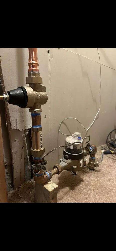 Slide of Pouring Rain Plumbing