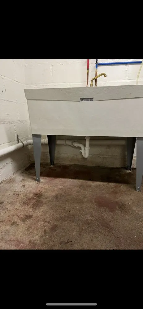 Slide of Pouring Rain Plumbing