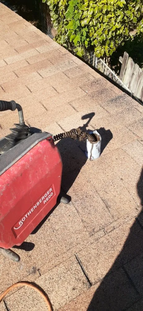 Slide of Precise Backflow and Drain Cleaning