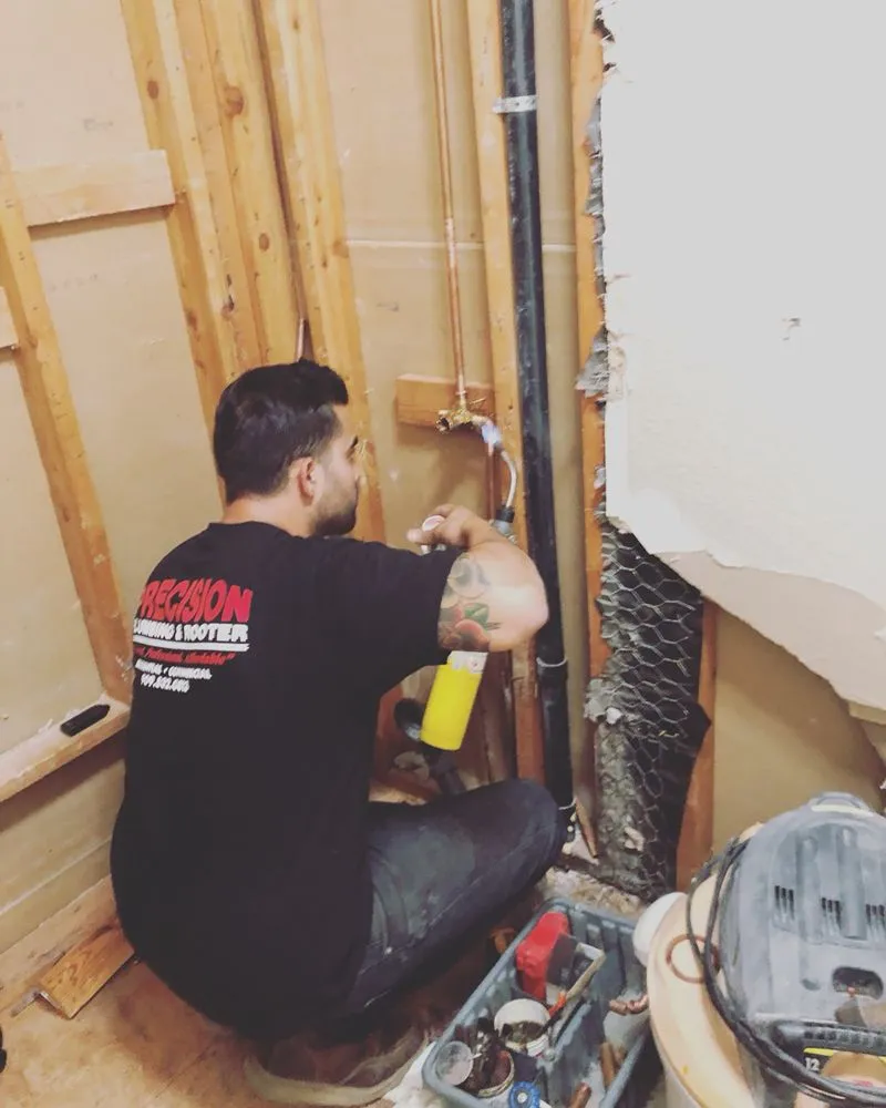 Slide of Precision Plumbing & Rooter