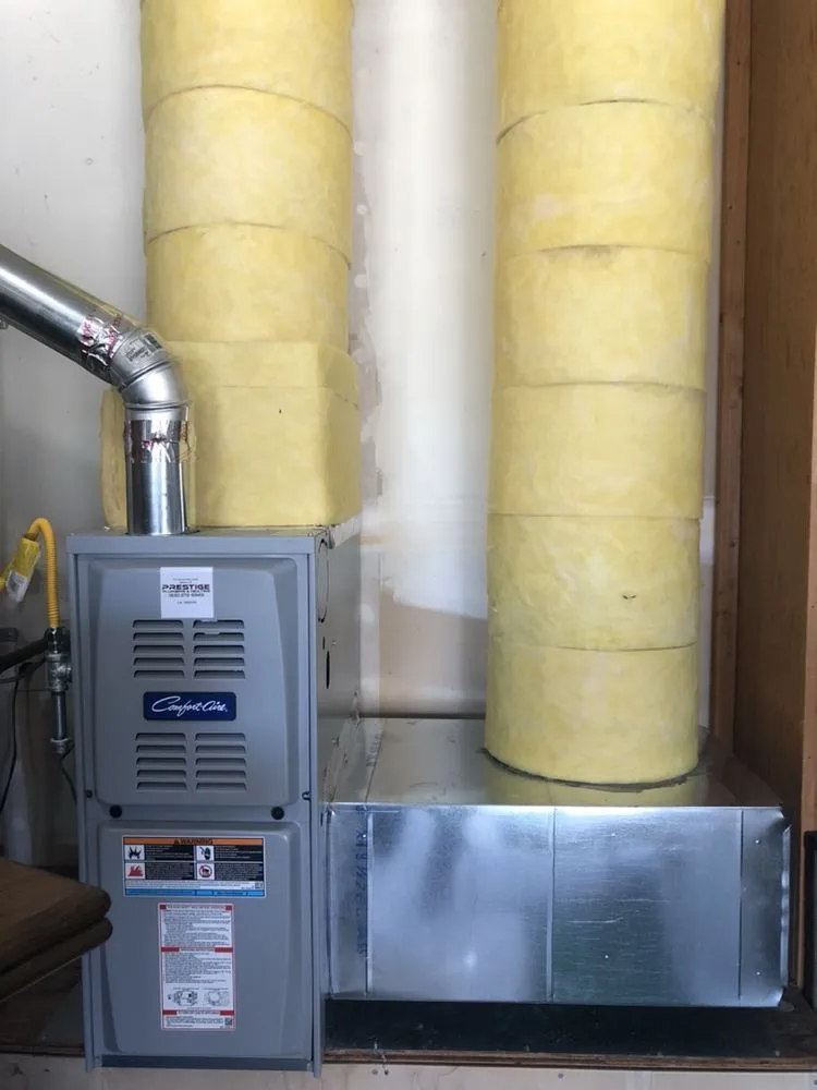 Slide of Prestige Plumbing and Heating