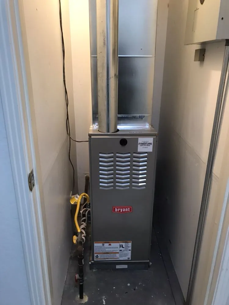 Slide of Prestige Plumbing and Heating