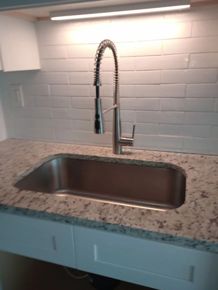 Slide of Prestige Plumbing and Restoration