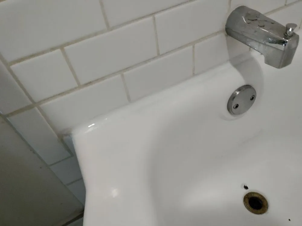 Slide of Pro Bath & Shower Caulking