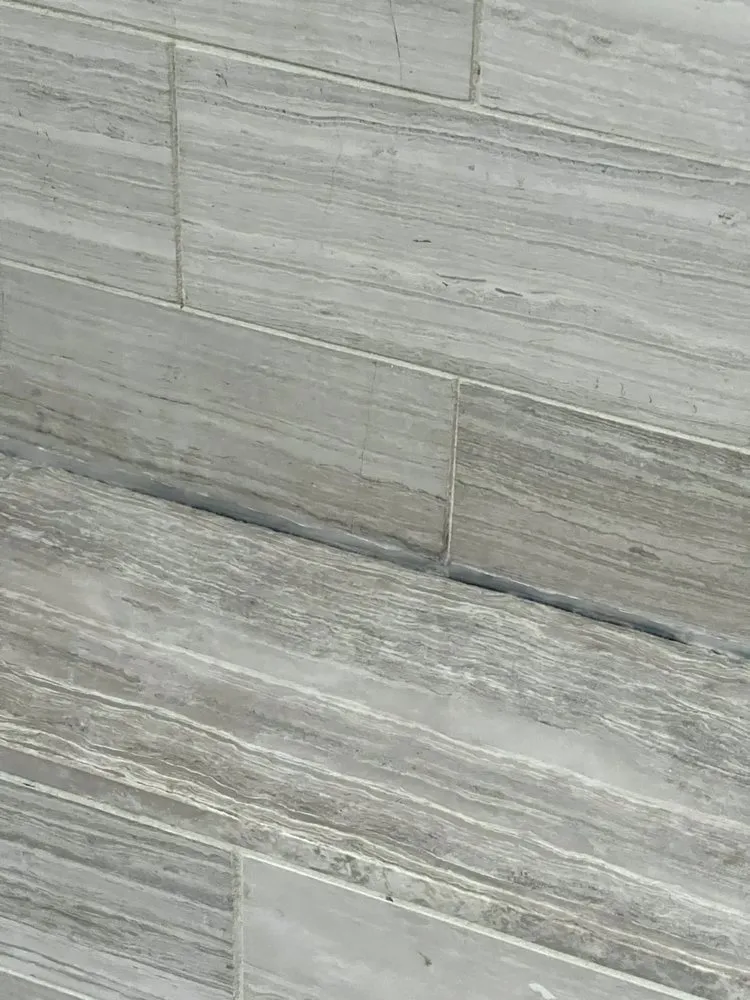 Slide of Pro Bath & Shower Caulking