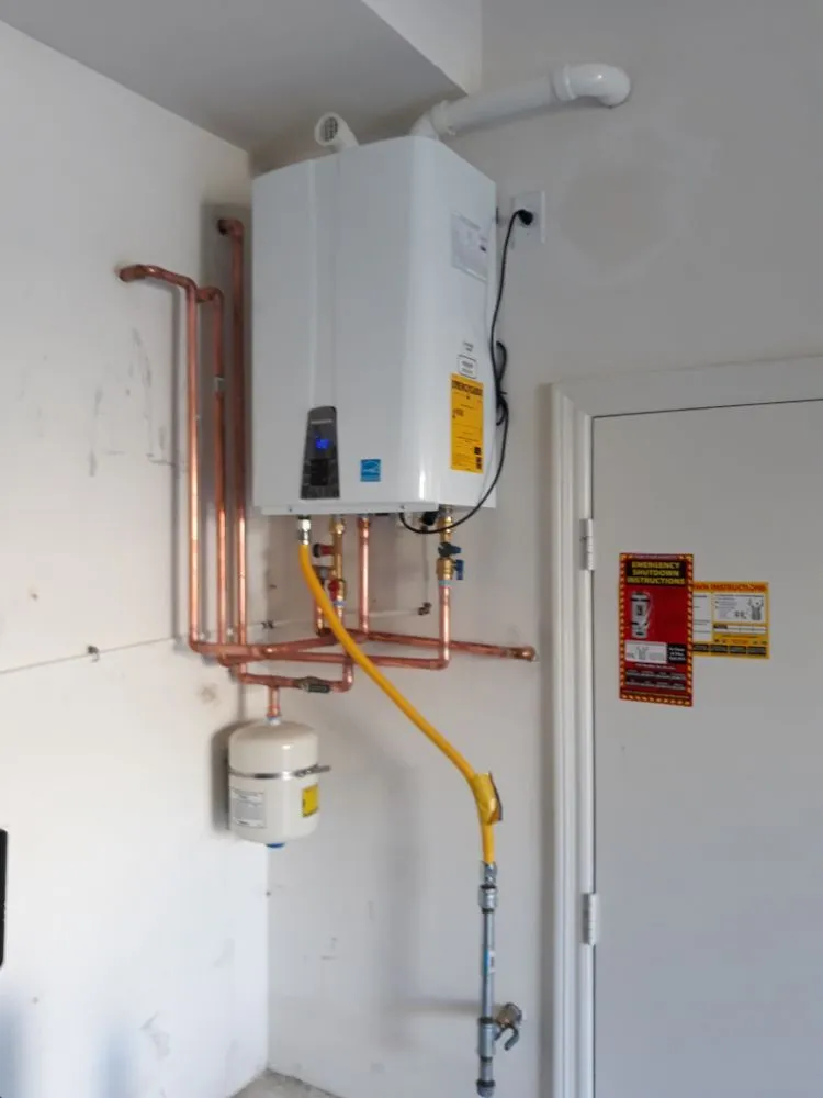 Slide of ProMax Tankless Water Heaters & Plumbing