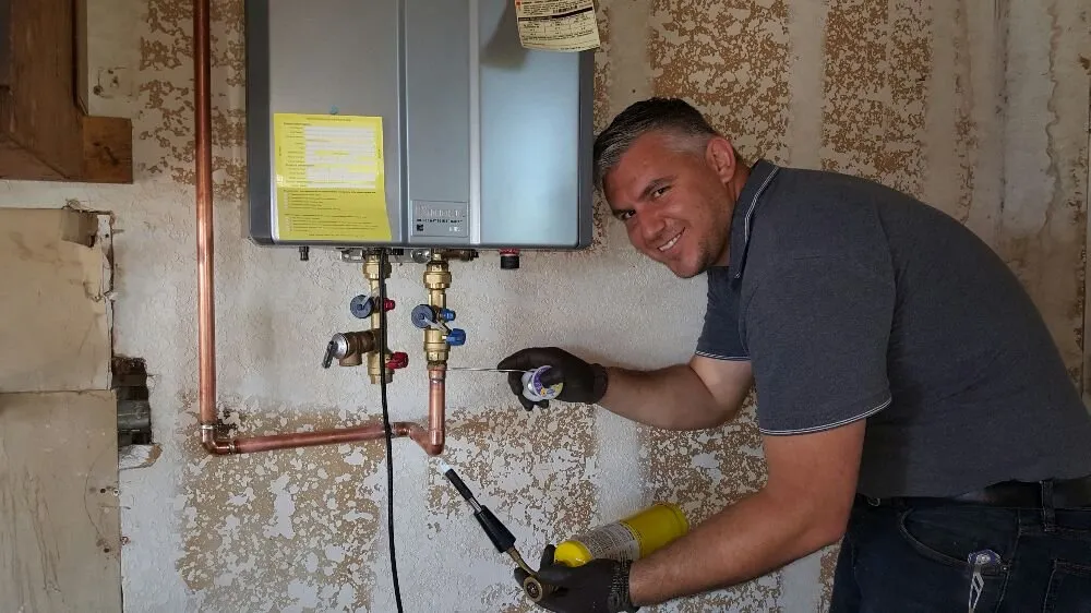 Slide of ProMax Tankless Water Heaters & Plumbing