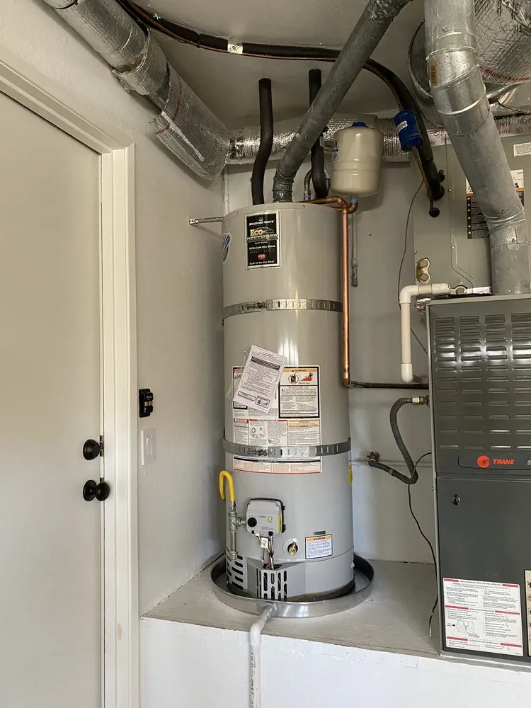 Slide of ProMax Tankless Water Heaters and Plumbing