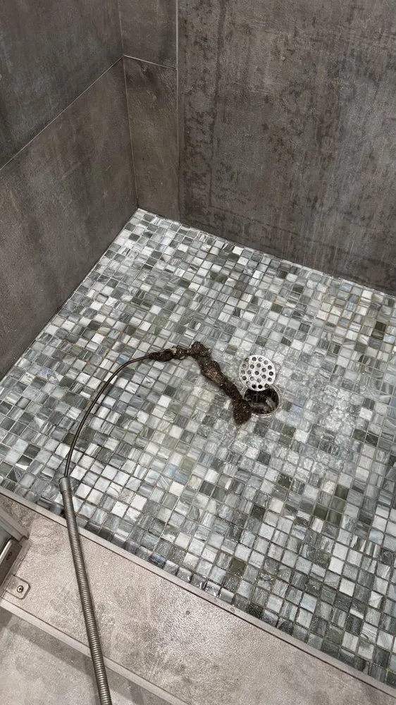 Slide of QL Drain Cleaning & Plumbing