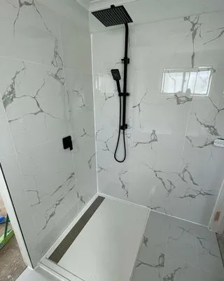 Queens Village Plumbing Logo