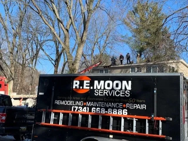 Slide of R E Moon Services