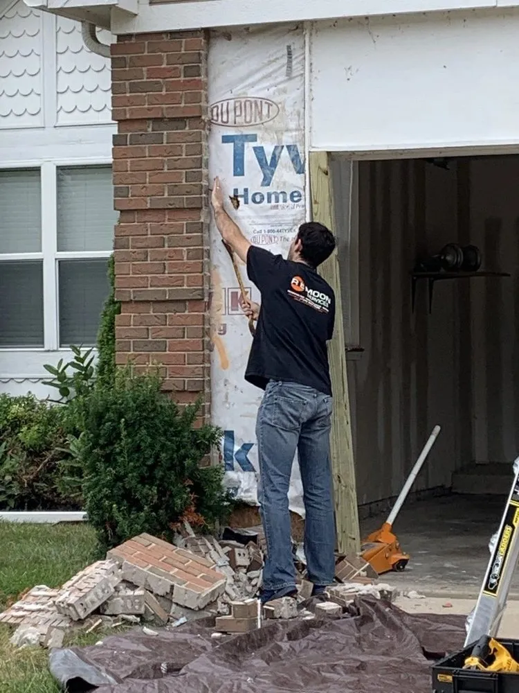 Slide of R E Moon Services