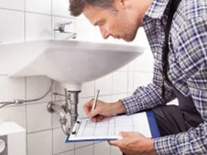 R.A. Guinner Plumbing Company Logo