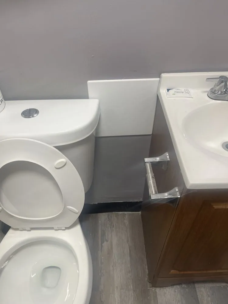 Slide of RAM Construction Services